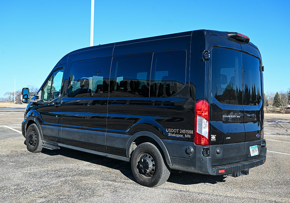 14-Passenger Limo Coach Bus at Nite Trane Transportation Shakopee